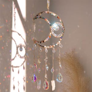 Crystal moon suncatcher window hanging with rainbow gemstone and prism accents